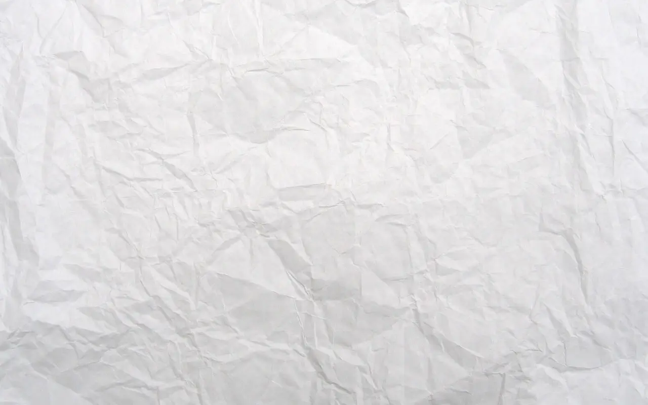 A blank sheet of white paper on a light surface